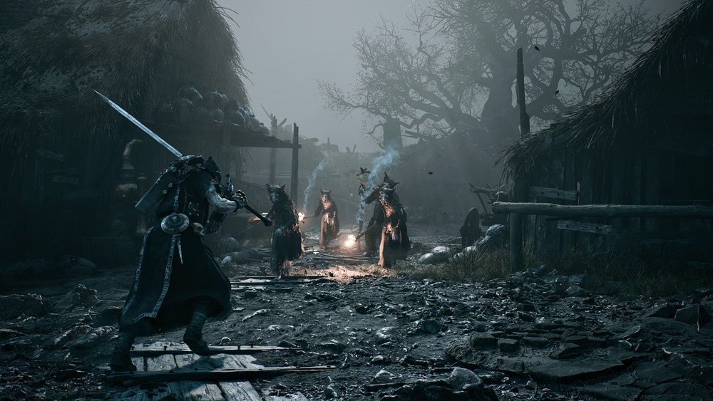 Official Mortal Shell II screenshot of an armored warrior standing in a dark open landscape.